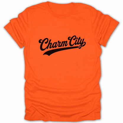 Orange t-shirt with black "Charm City" text in a script font.