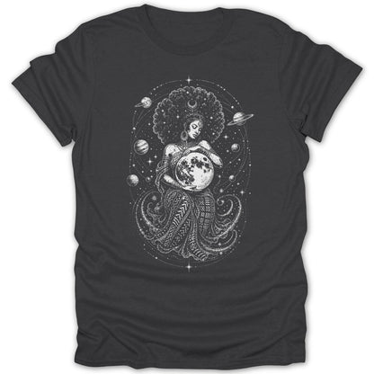 Woman with afro holding moon, surrounded by planets and stars on dark t-shirt.