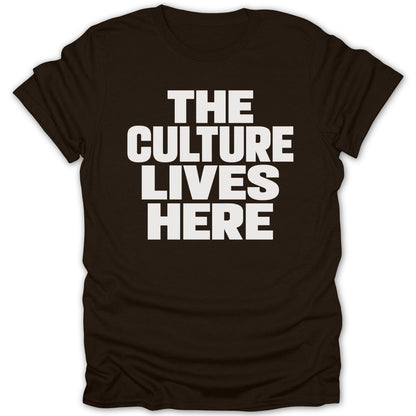 Brown t-shirt with white text that reads "THE CULTURE LIVES HERE"