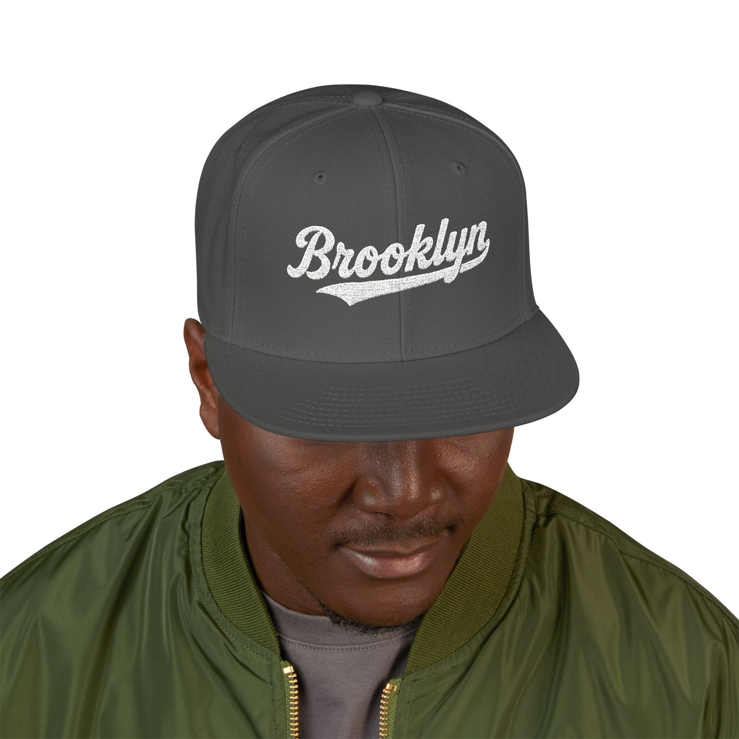 Dark gray baseball cap with "Brooklyn" embroidered in white script.