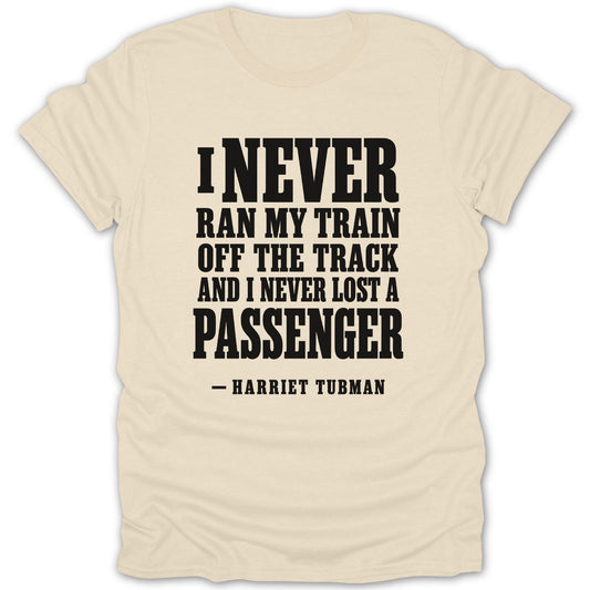 A cream-colored short-sleeved t-shirt with black text featuring a Harriet Tubman quote.