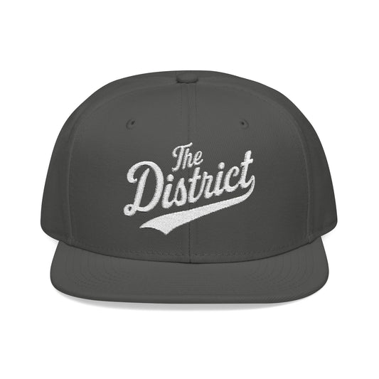 Charcoal snapback hat with "The District" embroidered in white.
