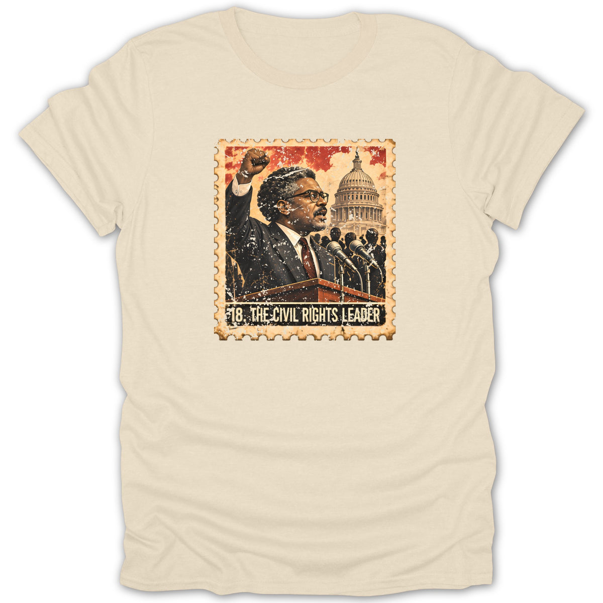 Cream-colored t-shirt featuring a postage stamp graphic of a civil rights leader with a raised fist.