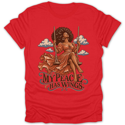 Woman with afro on swing, with text "MY PEACE HAS WINGS".