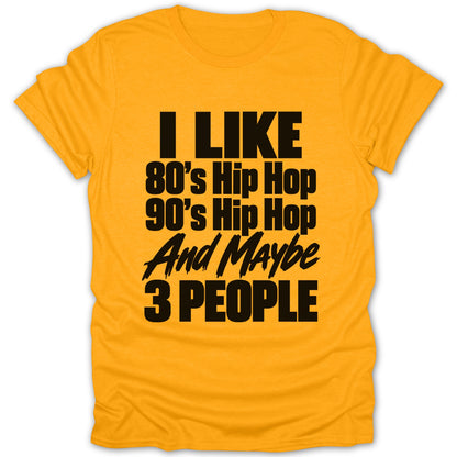 Orange t-shirt with black text saying "I LIKE 80's Hip Hop 90's Hip Hop And Maybe 3 PEOPLE"