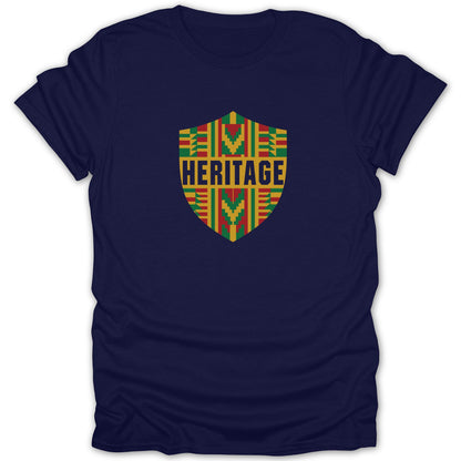 A dark blue short-sleeved t-shirt featuring a colorful shield graphic with the word HERITAGE.
