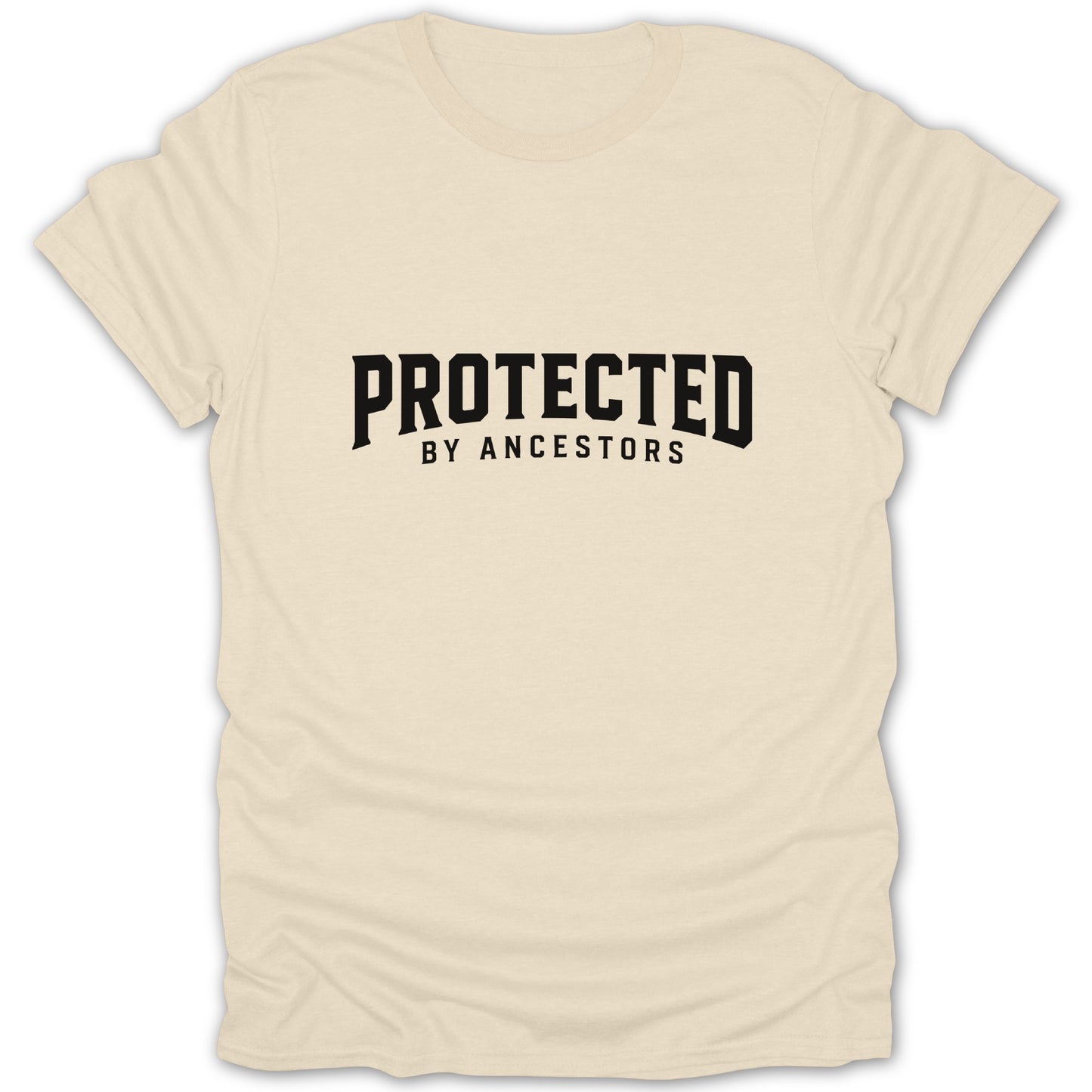 Cream t-shirt with bold black text reading "PROTECTED BY ANCESTORS".