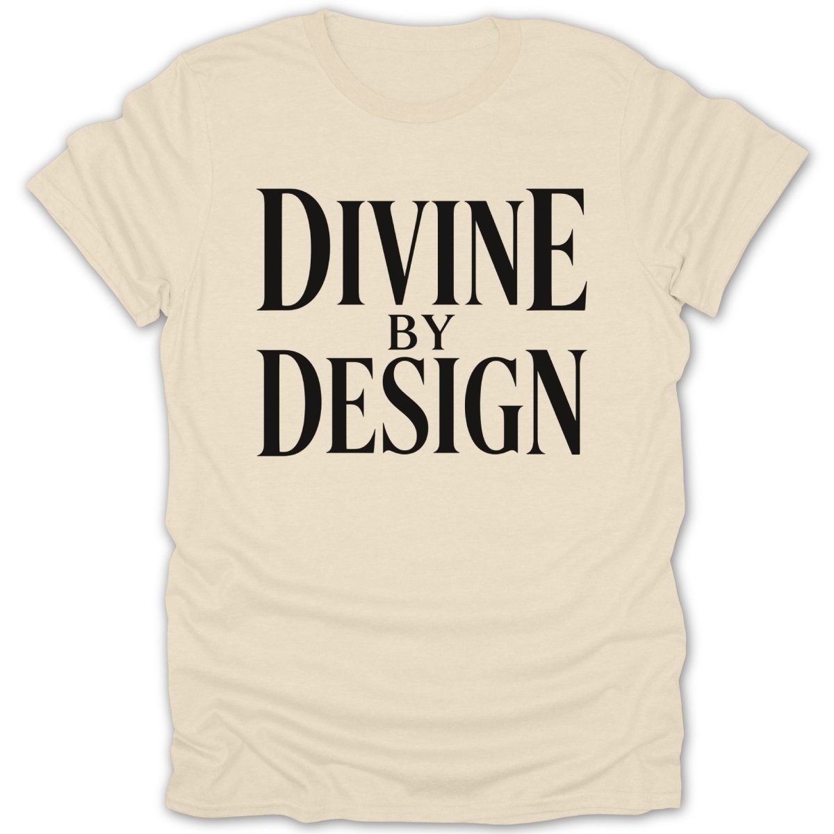 Cream t-shirt with black text that reads "DIVINE BY DESIGN".