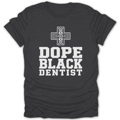 Dark t-shirt with white text "DOPE BLACK DENTIST" and a stylized cross graphic.