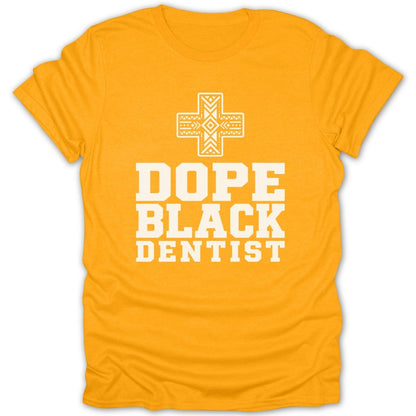 Yellow t-shirt with "DOPE BLACK DENTIST" text and a decorative cross.