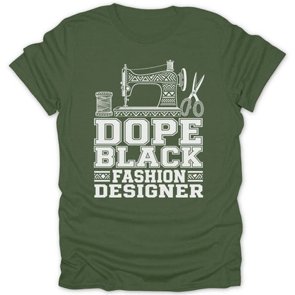 Green t-shirt with white graphic of sewing machine, scissors, thread, and text: DOPE BLACK FASHION DESIGNER.