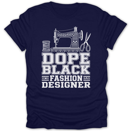 Navy t-shirt with white graphic that reads "Dope Black Fashion Designer" and depicts a sewing machine, thread, and scissors.
