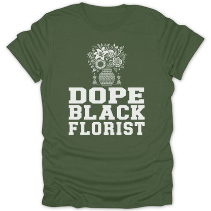 Green t-shirt with white text and floral graphic reading "Dope Black Florist".
