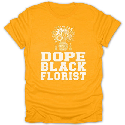Yellow t-shirt with white text "DOPE BLACK FLORIST" and flower vase graphic.