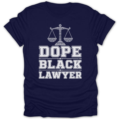 Navy t-shirt with white text reading "Dope Black Lawyer" and a decorative scales of justice.