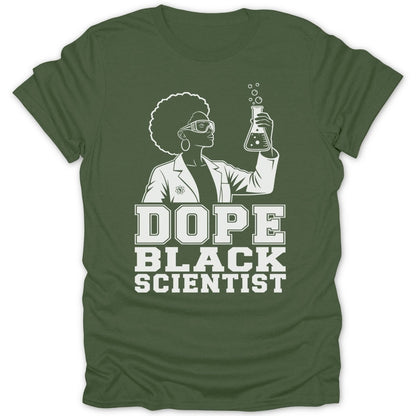 Green shirt with white graphic of a Black woman scientist holding a flask and text DOPE BLACK SCIENTIST.