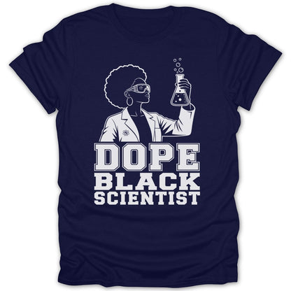 Dark blue t-shirt with white graphic of a woman with afro and glasses holding a beaker. Text reads "Dope Black Scientist".