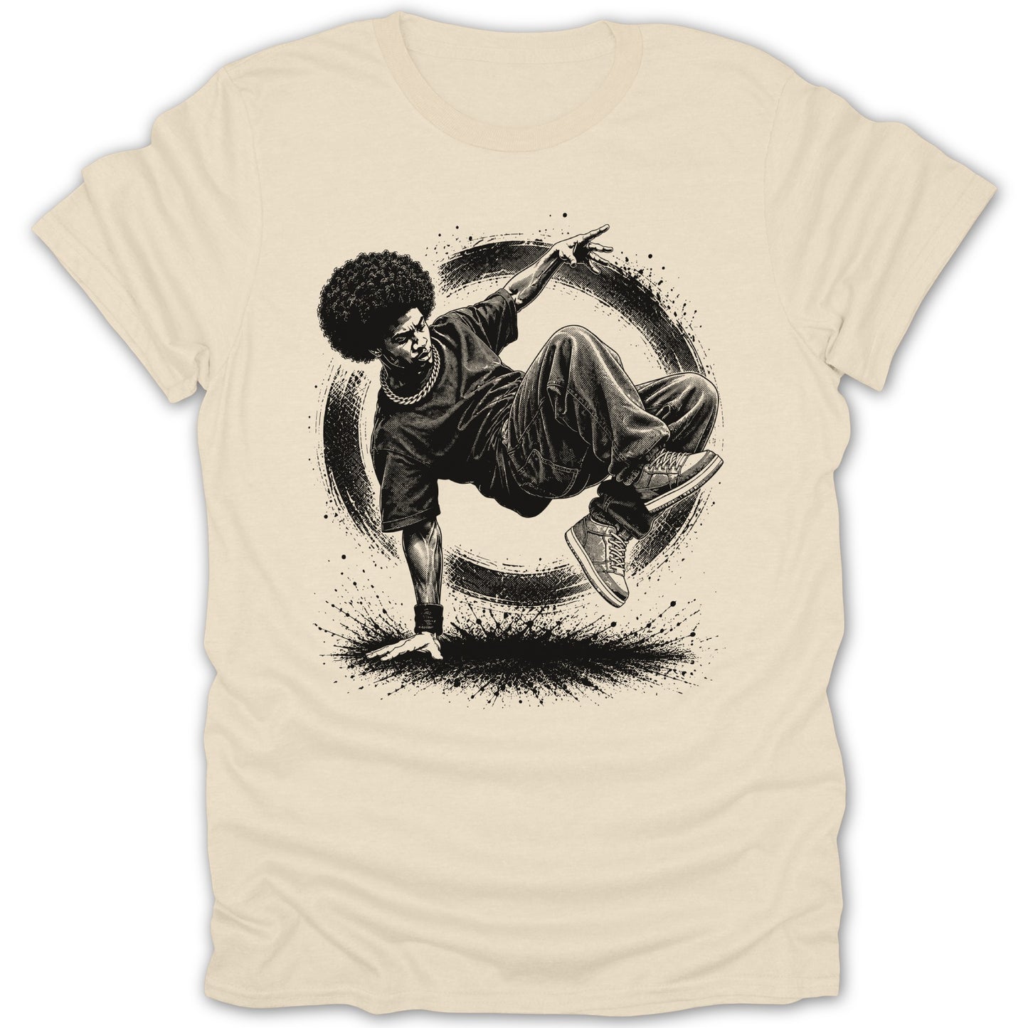 Breakdancer with afro performs a move on a tan t-shirt with black graphic.