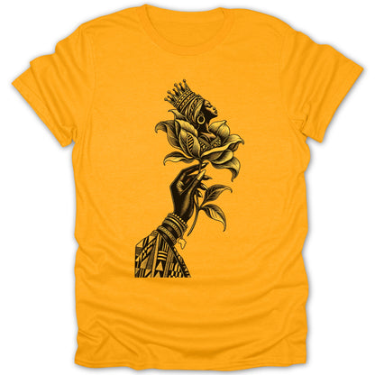 Black illustration of crowned woman's head and hand holding a flower on a yellow t-shirt.