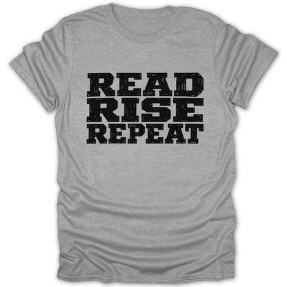 Grey t-shirt with black text "READ RISE REPEAT"