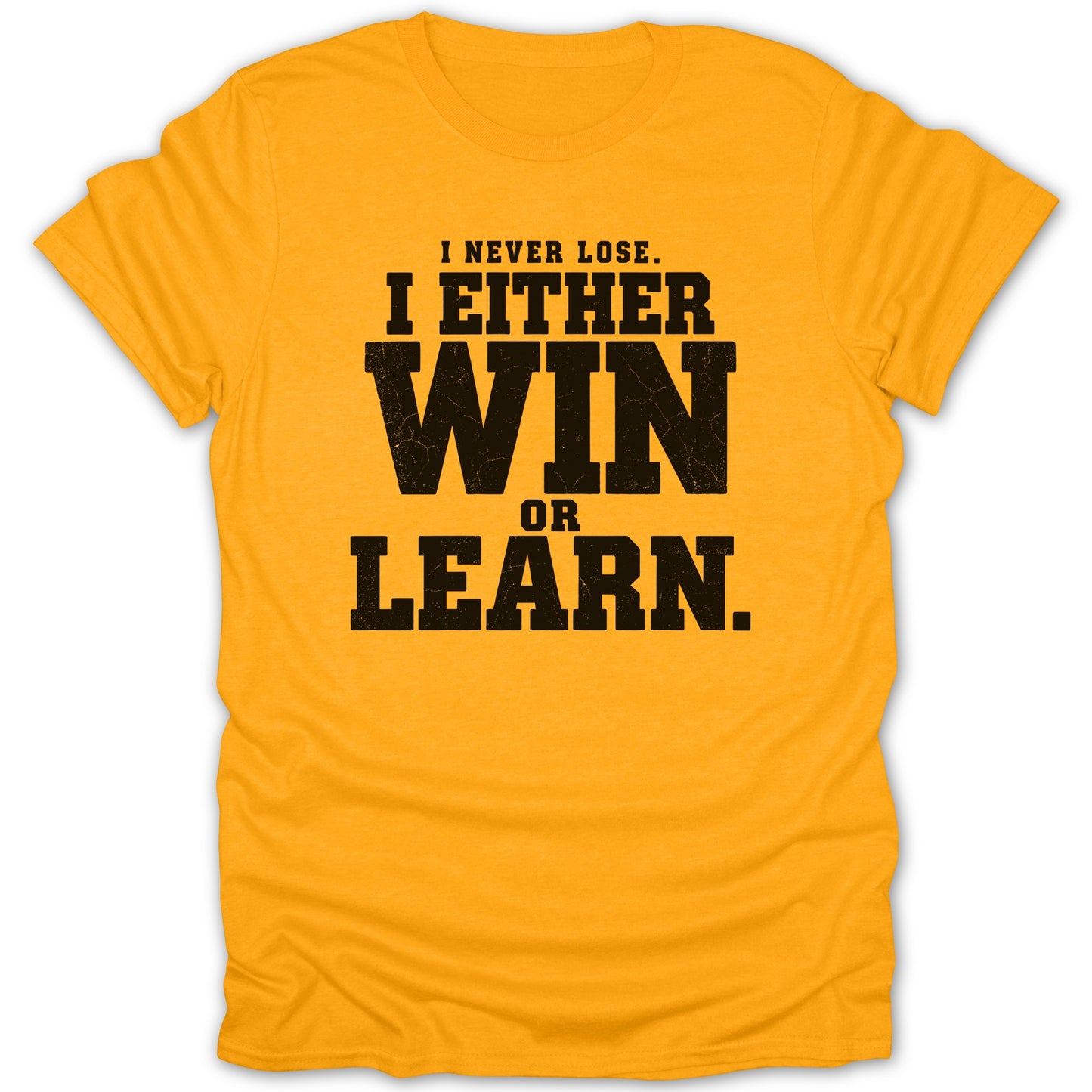 Yellow t-shirt with black text: "I NEVER LOSE. I EITHER WIN OR LEARN."
