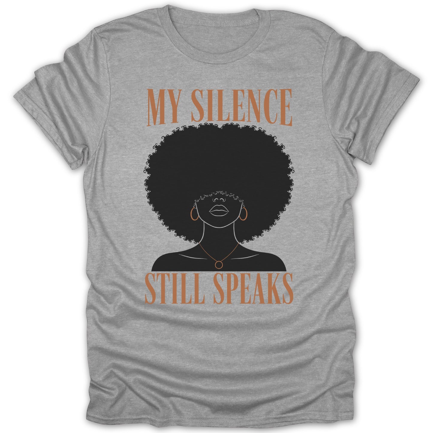 Grey t-shirt with a silhouette of a woman with an afro, reading "My Silence Still Speaks."