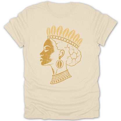 Cream t-shirt with a distressed golden profile of a woman wearing a crown and earrings.