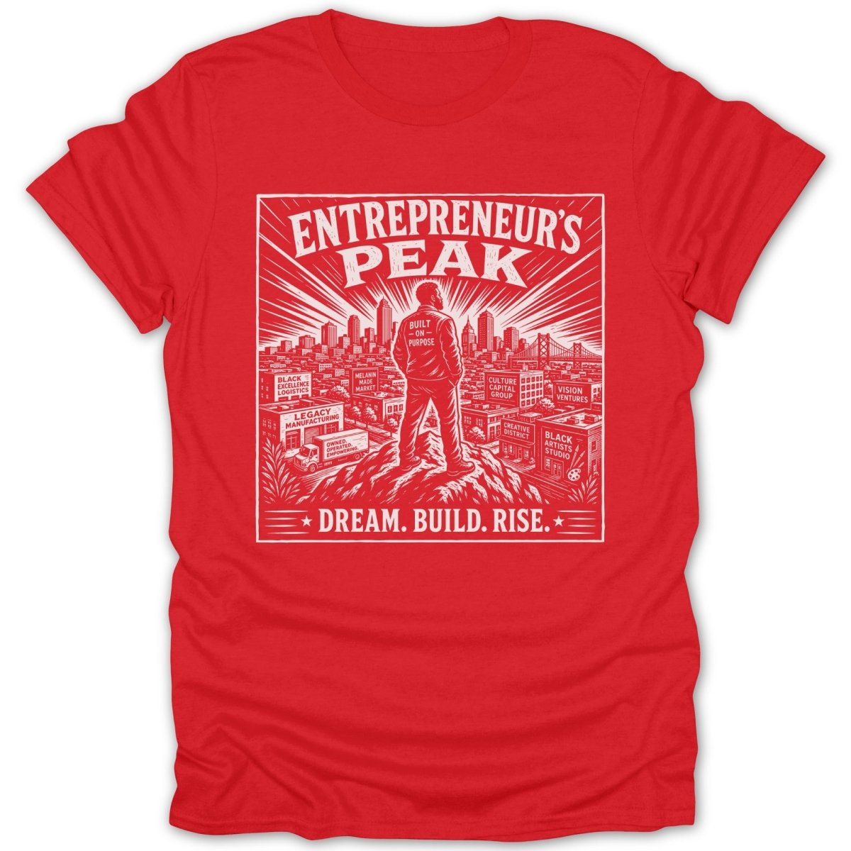 Red t-shirt featuring a graphic with the words "ENTREPRENEUR'S PEAK" and "DREAM. BUILD. RISE."