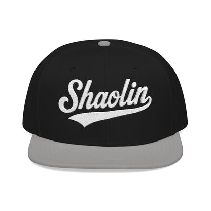 Black and gray flat-brimmed cap with "Shaolin" embroidered in white script.