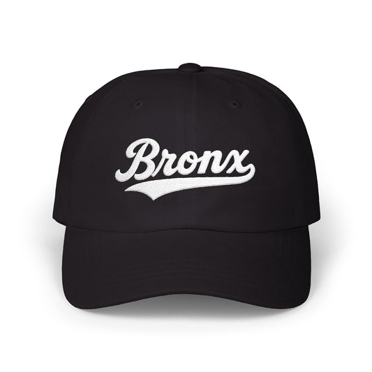 Black baseball cap with "Bronx" written in white cursive text.
