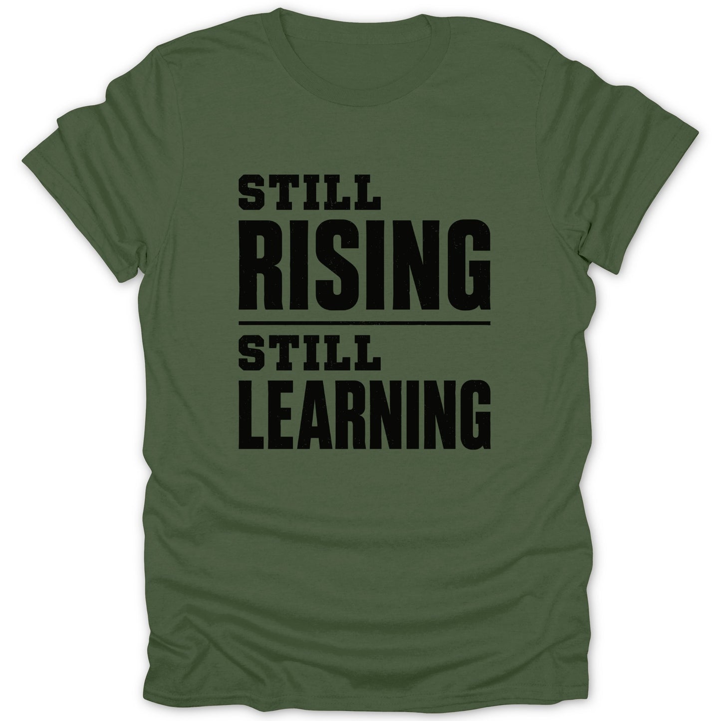 Olive green t-shirt with black text "STILL RISING STILL LEARNING".