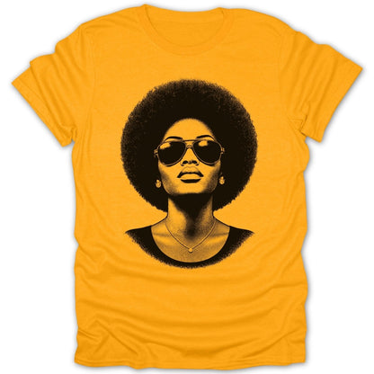 Yellow t-shirt with a black graphic of a woman with an afro and sunglasses.