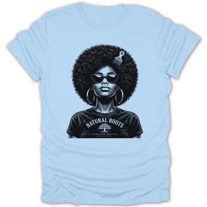 Black and white graphic of a woman with a large afro, sunglasses, and hoop earrings on a light blue t-shirt.