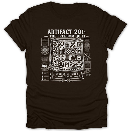 Dark brown t-shirt featuring white text and graphic of "Artifact 201: The Freedom Quilt".