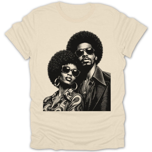 Black and white graphic of a couple with afros and sunglasses on a cream t-shirt.