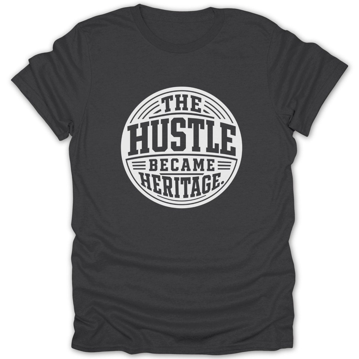 Dark grey t-shirt with white text: THE HUSTLE BECAME HERITAGE.