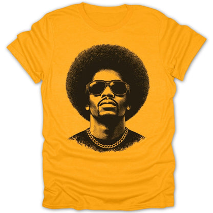 Yellow t-shirt with black graphic of a man with an afro and sunglasses.