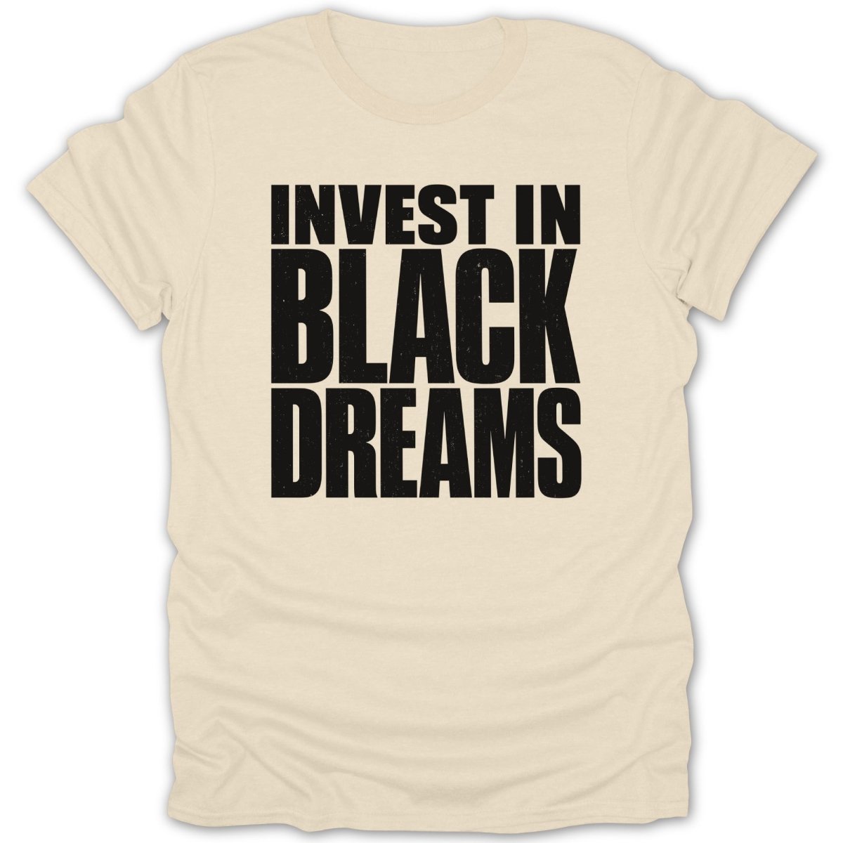 Cream t-shirt with black distressed text "INVEST IN BLACK DREAMS".