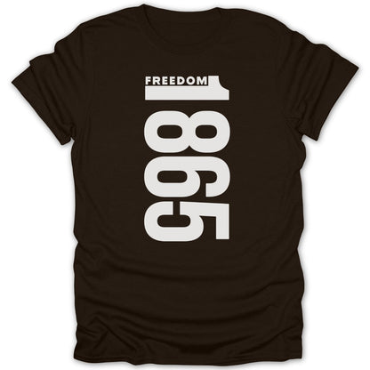 Dark brown t-shirt with large white text "1865" and "FREEDOM" above it.
