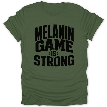 Green t-shirt with black text reading "MELANIN GAME IS STRONG".