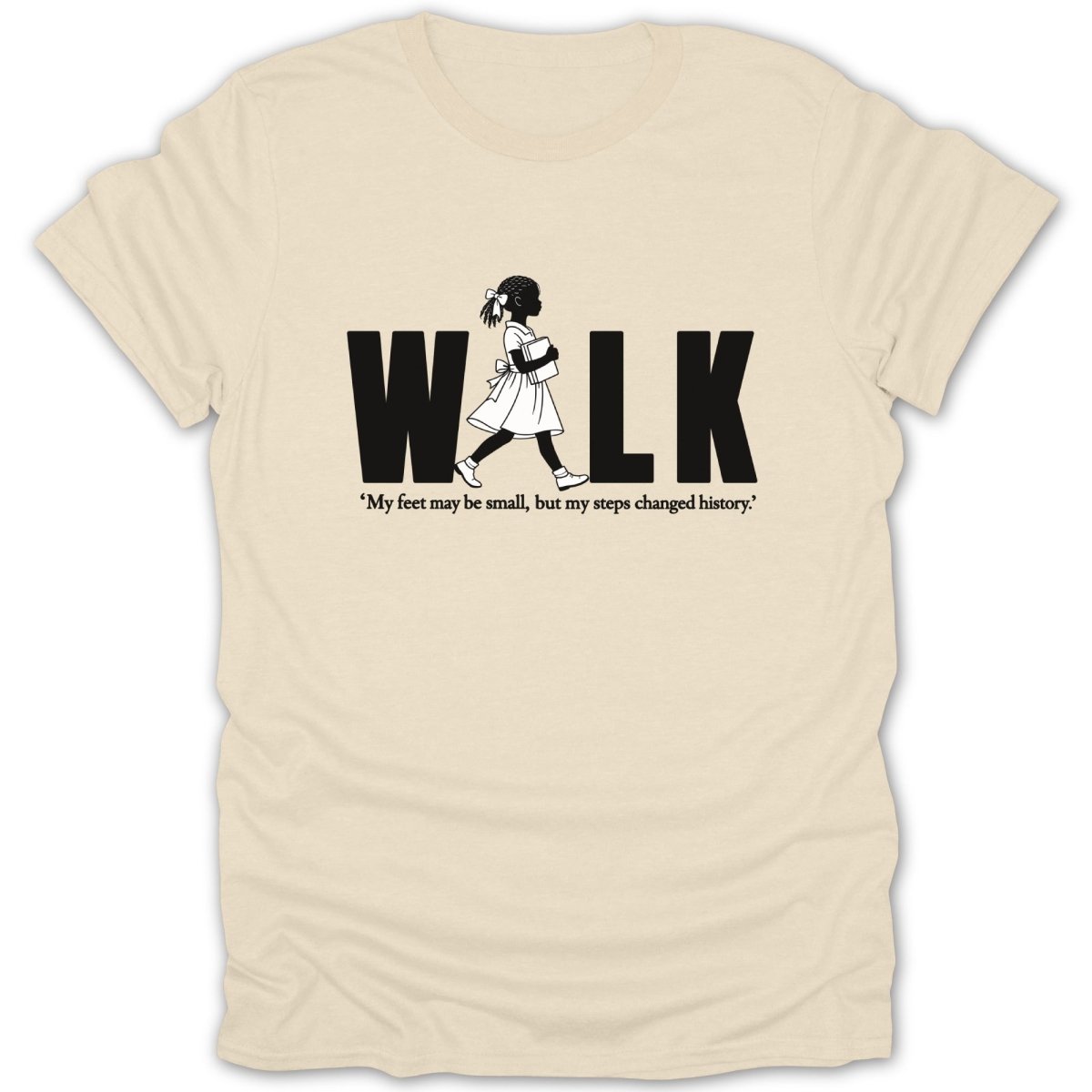 Cream t-shirt with "WALK" and a girl carrying books, and quote.