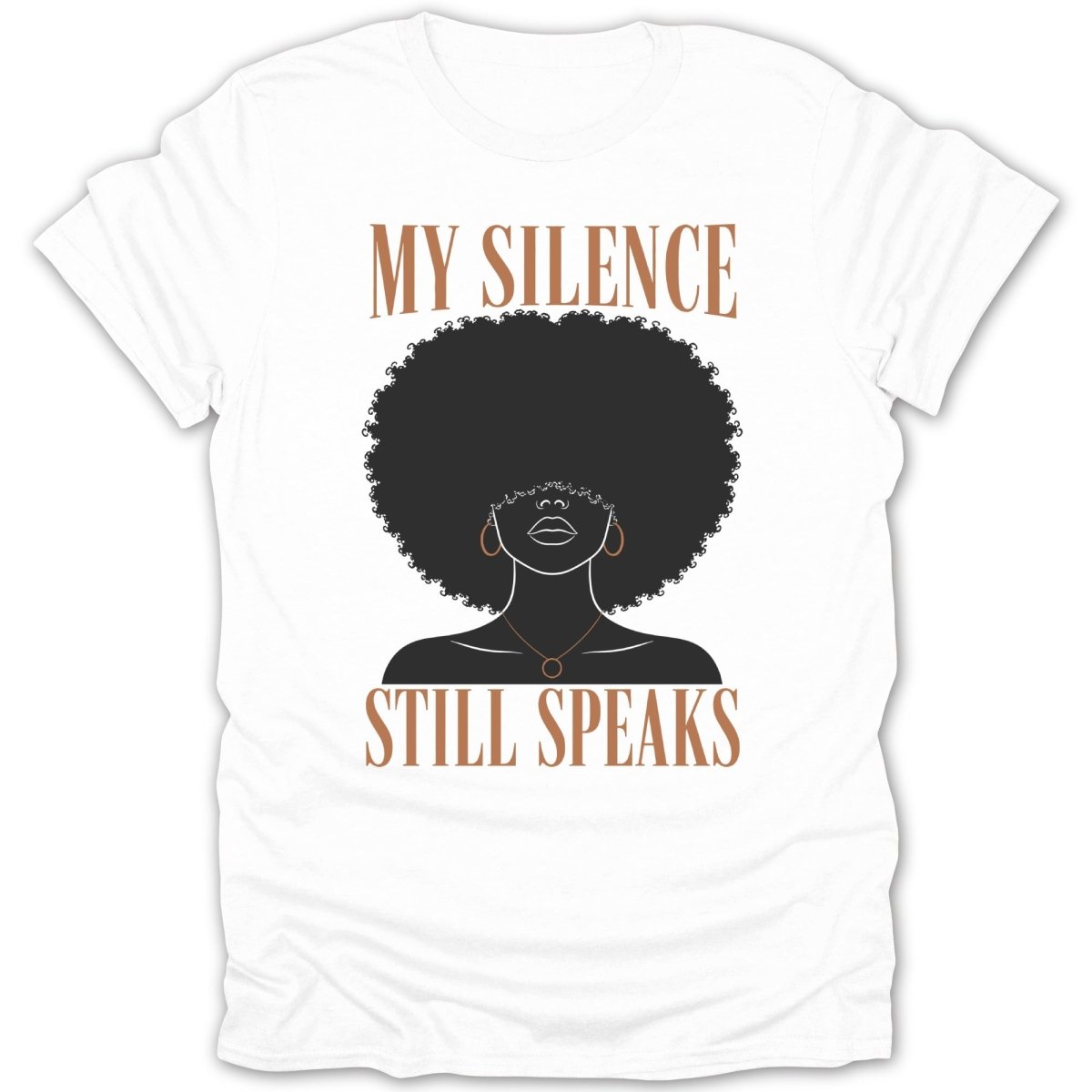 White t-shirt with graphic featuring black woman and text "MY SILENCE STILL SPEAKS".