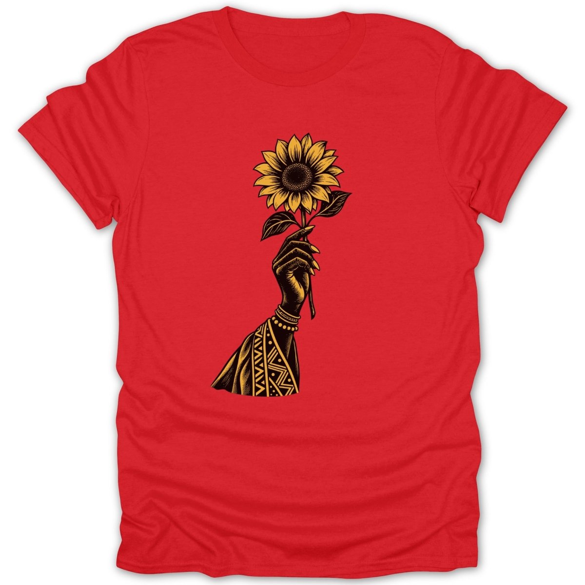 Black arm holding a sunflower with patterned sleeve and bracelet on red shirt.