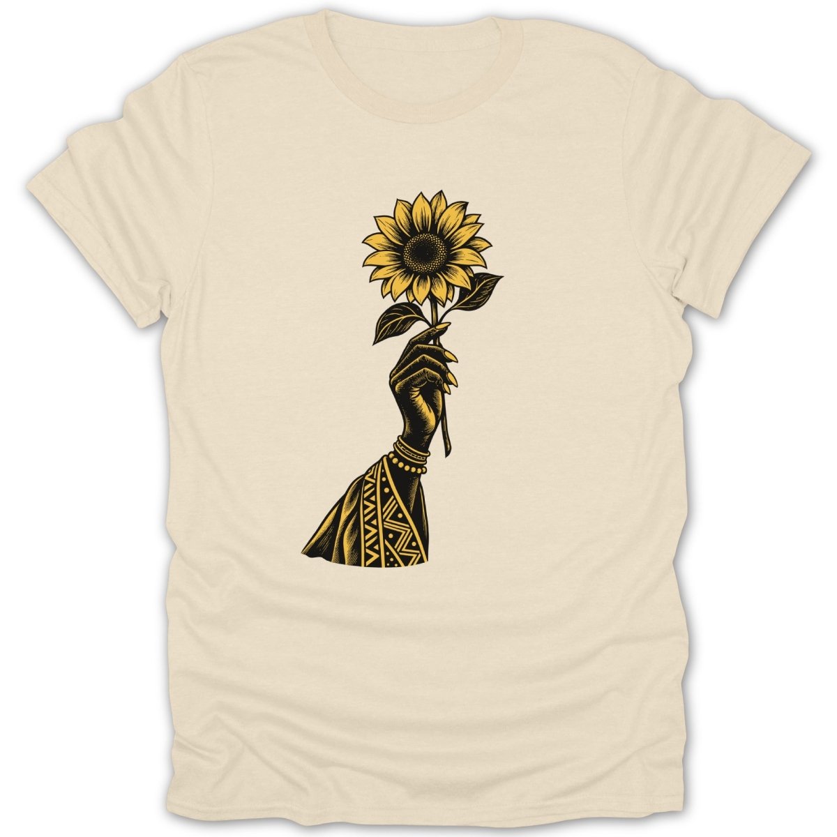 Black hand holding a sunflower with tribal pattern on forearm.