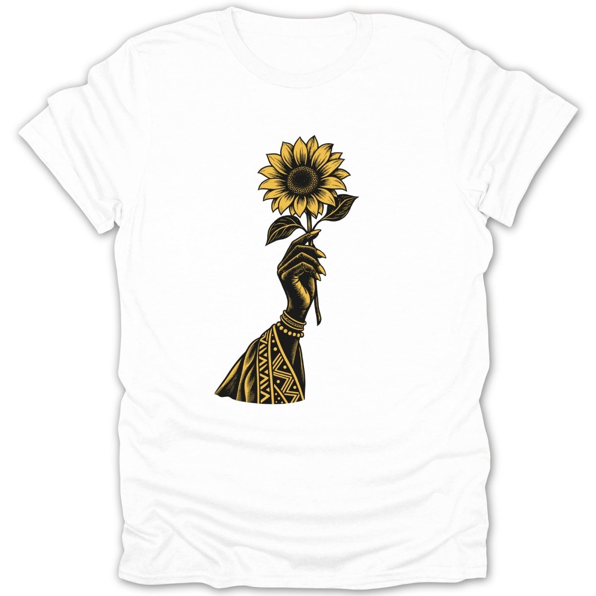 Black hand holding a yellow sunflower with tribal patterned sleeve on white t-shirt.