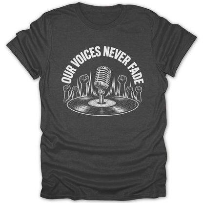 Dark t-shirt with white graphic of microphone, vinyl record, and fists, reads "OUR VOICES NEVER FADE".