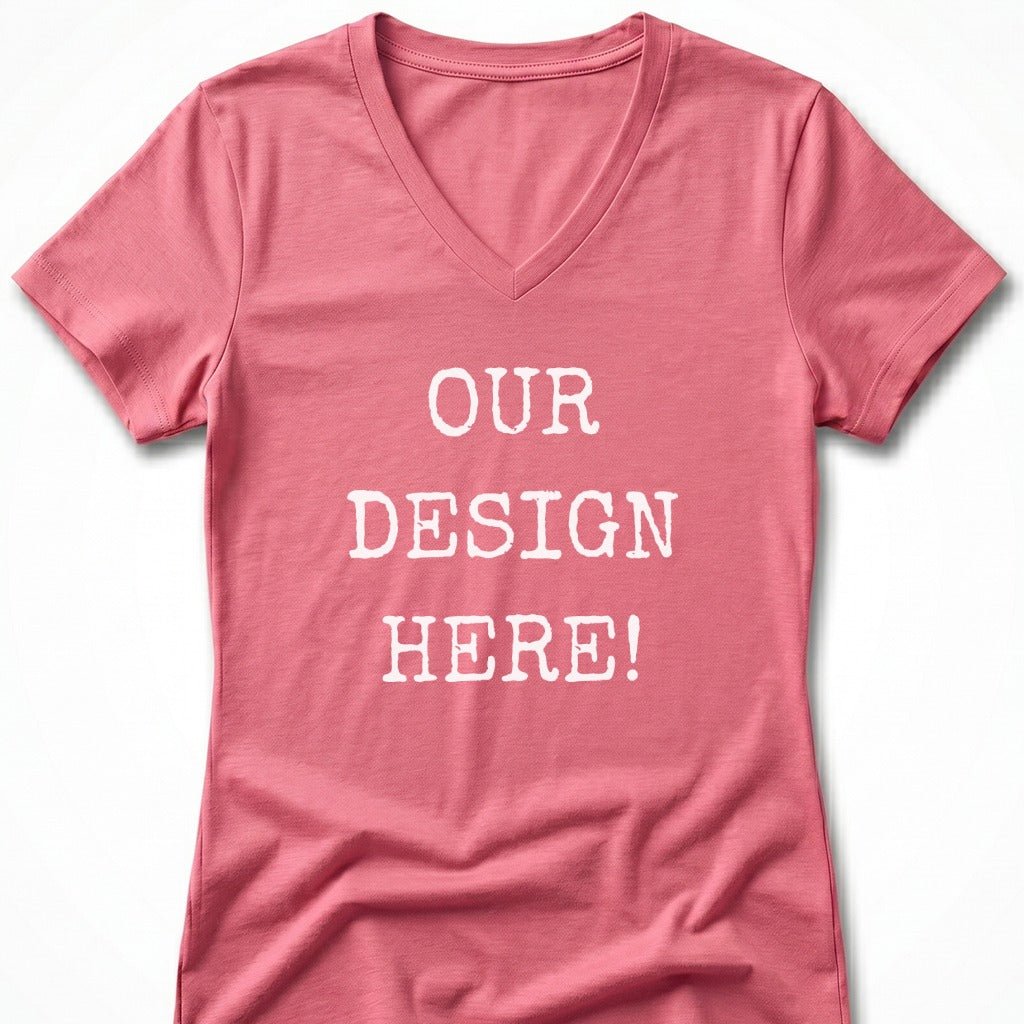 Pink v-neck t-shirt with white text "OUR DESIGN HERE!".