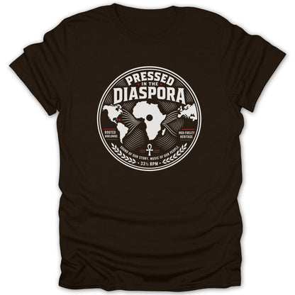 Brown t-shirt with "Pressed in the Diaspora" text, world map, and musical symbols.