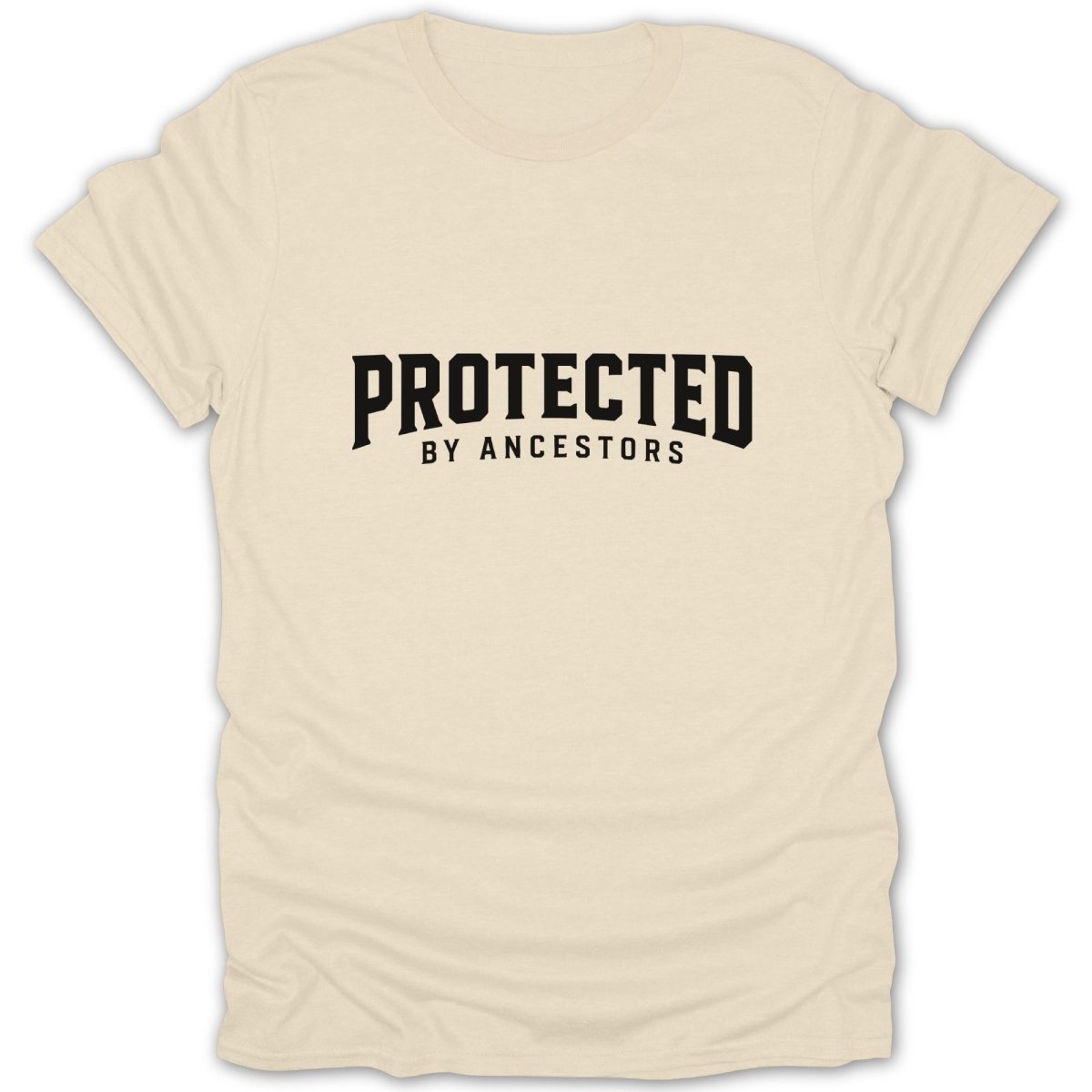 Cream t-shirt with bold black text reading "PROTECTED BY ANCESTORS".