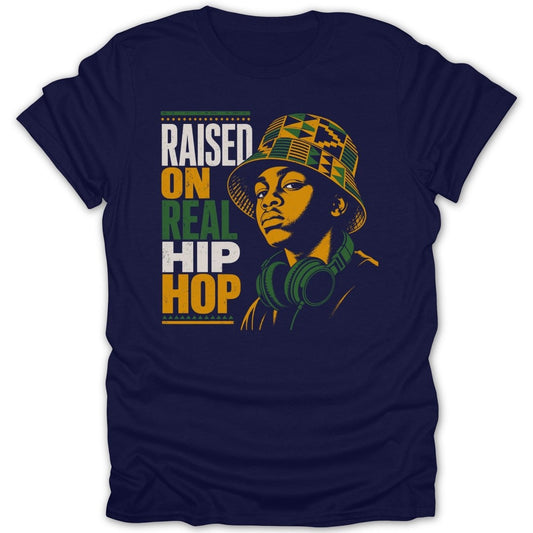 T-shirt graphic with text "RAISED ON REAL HIP HOP" and a young person wearing headphones and a patterned bucket hat.